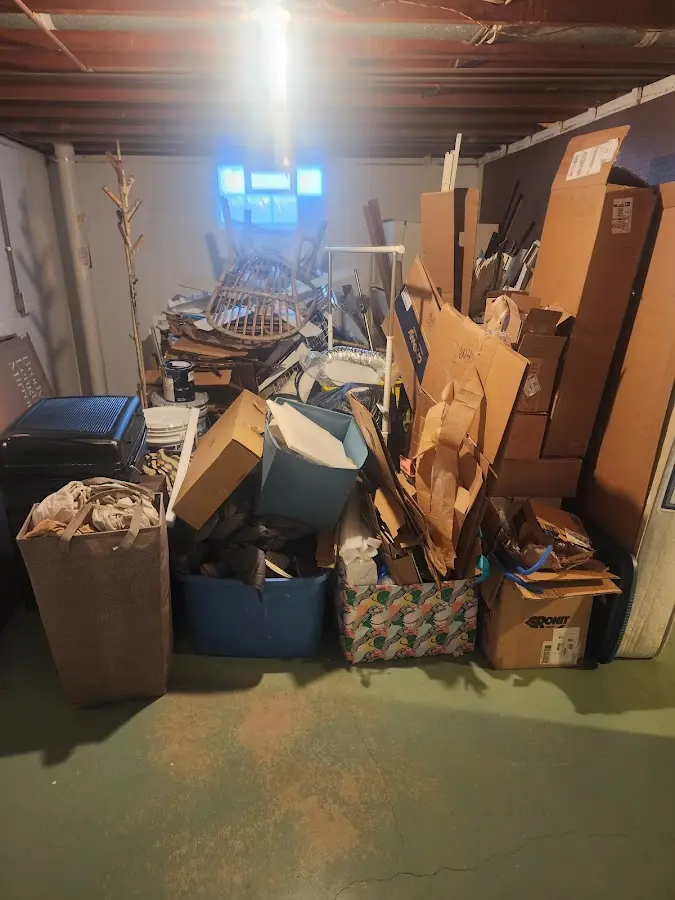 Roll-off dumpster container at job site for Concrete Dumpster Rental in Kingsland